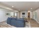 Cozy living room with hardwood floors, comfortable seating, and recessed lighting at 129 Rosewood Dr, Cicero, IN 46034