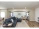 Comfortable living room featuring a large sectional sofa and a cozy armchair at 129 Rosewood Dr, Cicero, IN 46034