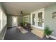 Sunroom featuring ceiling fan, seating, and lots of light at 129 Rosewood Dr, Cicero, IN 46034