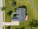 An overhead view showcasing the home's roof, backyard, and surrounding green lawn at 13553 Lorenzo Blvd, Carmel, IN 46074