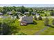 A nice aerial view of the backyard featuring a deck and a large, well-maintained lawn at 13553 Lorenzo Blvd, Carmel, IN 46074