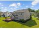 Spacious backyard features a wooden deck perfect for outdoor entertaining and relaxation at 13553 Lorenzo Blvd, Carmel, IN 46074