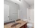 Bathroom featuring a large mirror, vanity and shower-tub combo at 13553 Lorenzo Blvd, Carmel, IN 46074