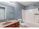 Bathroom features vanity, toilet, and bathtub with shower head at 13553 Lorenzo Blvd, Carmel, IN 46074