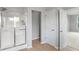 Bathroom with shower, and access to other living spaces at 13553 Lorenzo Blvd, Carmel, IN 46074
