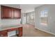 Bright dining area connects to kitchen and features lots of natural light at 13553 Lorenzo Blvd, Carmel, IN 46074