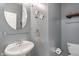 Charming powder room with pedestal sink and decorative wall art at 13553 Lorenzo Blvd, Carmel, IN 46074