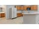 Wet bar features wooden cabinets and a microwave, perfect for entertaining guests at 13553 Lorenzo Blvd, Carmel, IN 46074