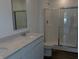 Contemporary bathroom featuring a dual sink vanity, and a shower at 1400 Bluebonnet Pl, Shelbyville, IN 46176