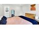Bedroom view showcasing an adjacent bathroom and contemporary decor elements at 1434 Laurel St, Indianapolis, IN 46203