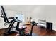 Exercise room features wood floors and natural light streaming through the windows at 1434 Laurel St, Indianapolis, IN 46203