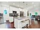 Modern kitchen featuring white cabinets, stainless steel appliances, and granite countertops at 1434 Laurel St, Indianapolis, IN 46203