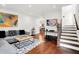 Inviting living room with comfortable seating, hardwood floors, and stylish decor at 1434 Laurel St, Indianapolis, IN 46203
