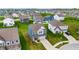 Attractive aerial shot of a residential neighborhood featuring modern homes with well-kept lawns and driveways at 1464 Buckland Ct, Avon, IN 46123