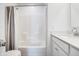 A clean bathroom features a shower with a bathtub and modern fixtures at 1464 Buckland Ct, Avon, IN 46123