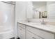 The bathroom vanity features double sinks with stylish faucets and a quartz countertop at 1464 Buckland Ct, Avon, IN 46123