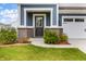 Welcoming front entrance with a charming porch, brick accents, and manicured landscaping at 1464 Buckland Ct, Avon, IN 46123