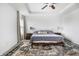 The main bedroom features a large bed and decorative rug, along with recessed lighting at 1464 Buckland Ct, Avon, IN 46123