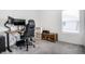 Bright home office with a sleek desk, dual monitors, and comfortable ergonomic gaming chair at 1464 Buckland Ct, Avon, IN 46123