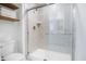 A modern walk-in shower features tile walls, a glass enclosure, and sleek fixtures at 1464 Buckland Ct, Avon, IN 46123