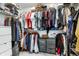 This walk-in closet includes many hanging racks, shelves, and drawers for ample storage at 1464 Buckland Ct, Avon, IN 46123