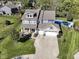 Aerial view of property showing a manicured lawn, mature trees, and an inviting home exterior at 15378 Dorman Ct, Fishers, IN 46040