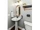 Chic powder room featuring stylish fixtures and a minimalist design at 15378 Dorman Ct, Fishers, IN 46040