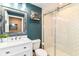 Bathroom features stylish vanity, framed mirror and a modern glass-enclosed shower at 15378 Dorman Ct, Fishers, IN 46040
