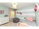 Comfortable bedroom with a twin bed, soft beanbag chair, and lovely decor at 15378 Dorman Ct, Fishers, IN 46040