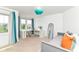 Bright bedroom with a bed, white desk, and large windows with lots of natural light at 15378 Dorman Ct, Fishers, IN 46040