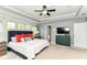 Spacious Main Bedroom: Tray ceiling, TV, and ensuite bathroom at 15378 Dorman Ct, Fishers, IN 46040