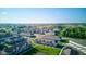 Expansive aerial view of a well-planned community with lush green spaces and attractive townhome developments at 17237 Rancorn Pl, Westfield, IN 46074