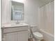 Bright bathroom featuring a sleek vanity, modern fixtures, and a shower with a neutral-colored curtain at 17237 Rancorn Pl, Westfield, IN 46074