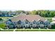 Stylish townhomes with manicured landscaping and inviting curb appeal in a well-maintained community at 17237 Rancorn Pl, Westfield, IN 46074