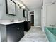 Bathroom with double sink vanity and tiled floor at 1760 Pumpkinvine Hill Rd, Martinsville, IN 46151
