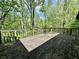 Wooden deck overlooking lush trees at 1760 Pumpkinvine Hill Rd, Martinsville, IN 46151