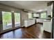 Renovated Kitchen opens to a deck with white cabinets and stainless appliances at 1760 Pumpkinvine Hill Rd, Martinsville, IN 46151