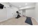 Finished basement featuring a home gym setup with exercise equipment and recessed lighting at 1787 Halifax St, Carmel, IN 46032