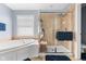 Contemporary bathroom with glass shower, soaking tub, and tiled walls at 1787 Halifax St, Carmel, IN 46032