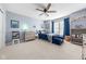 A cozy bedroom featuring plush carpet and decor, including a mounted Star Wars poster and a mounted light saber at 1787 Halifax St, Carmel, IN 46032