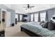 Large bedroom with a king bed, en suite bathroom, and dedicated desk area at 1787 Halifax St, Carmel, IN 46032
