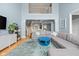 Bright open living room with fireplace, sectional seating, and soaring ceilings at 1787 Halifax St, Carmel, IN 46032