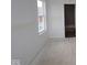 Bedroom with natural light, a window, and a doorway provides a blank canvas for personal design at 1874 Victor Higgins Dr, Shelbyville, IN 46176