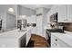 A stunning kitchen showcases white cabinets, stainless steel appliances, and a functional center island at 2006 Monticlair Ln, Columbus, IN 47201