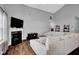 Spacious living room with fireplace, vaulted ceiling, and comfortable seating area at 2006 Monticlair Ln, Columbus, IN 47201