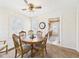 Inviting dining area with traditional furnishings and natural lighting at 2011 Sheffield Ave, Anderson, IN 46011