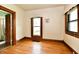 Bedroom with hardwood floors and abundant natural light at 2335 Main St, Elwood, IN 46036