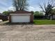 Detached two car garage featuring a white garage door at 2501 Mars Hill St, Indianapolis, IN 46241