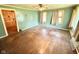Living room with original hardwood floors and bright, natural light at 2501 Mars Hill St, Indianapolis, IN 46241