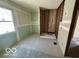 Bathroom in the process of being remodeled, featuring a window and the frame of a stand up shower at 2701 N Gale St, Indianapolis, IN 46218